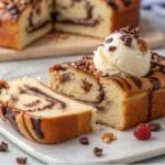 Cookie Dough Nutella Brioche: Perfectly Decadent and Easy to Make 7 A close-up of Cookie Dough Nutella Brioche showcasing its golden-brown crust and swirls of Nutella and cookie dough.