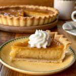 Irresistible Dolly Parton’s Butterscotch Pie 5 A whole butterscotch pie with a golden crust, showcasing Dolly Parton's classic dessert.